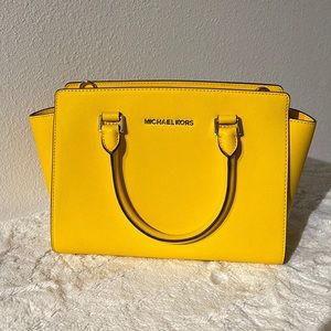 Michael Kors handbag yellow with old hardware. New never used missing tag only.
